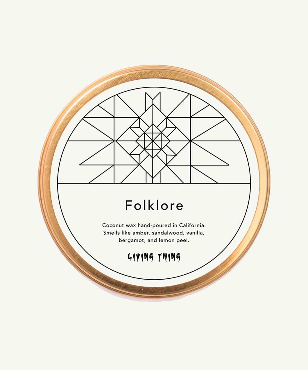 Living Thing = Folklore Candle Travel Tin: Amber, Vanilla + Lemon Peel